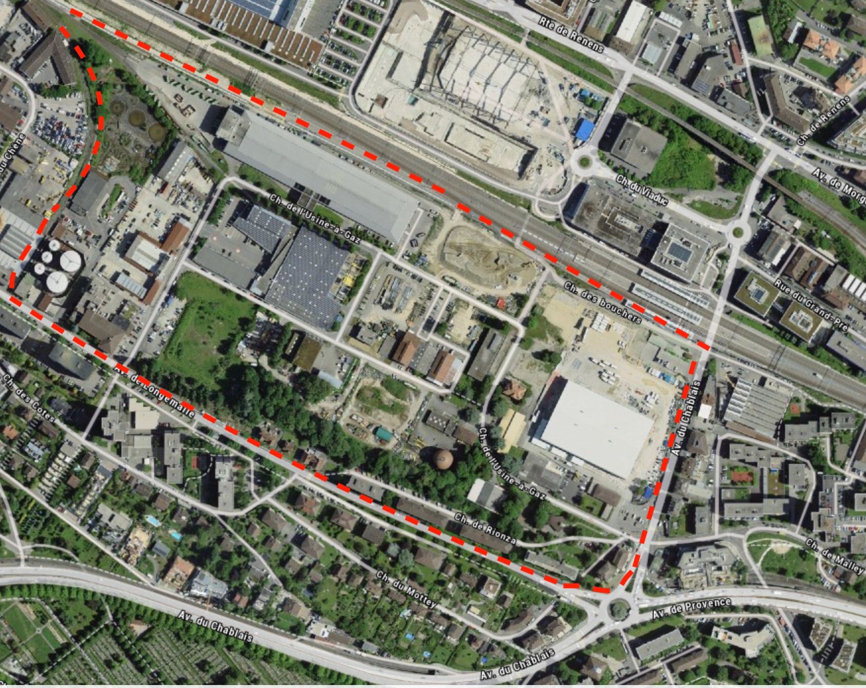 Photo aérienne dont l'une des zones est ceinte d'un pointillé rouge.